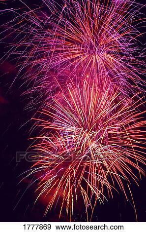 Exploding colorful fireworks View Large Photo Image Stock Photo - Exploding colorful fireworks. Fotosearch