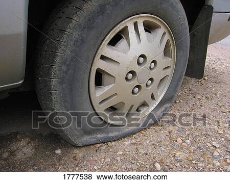 Flat tire View Large Photo Image Stock Photo - Flat tire. Fotosearch