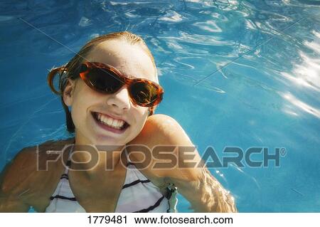 Girl with sunglasses View Large Photo Image Stock Image - Girl with sunglasses. Fotosearch