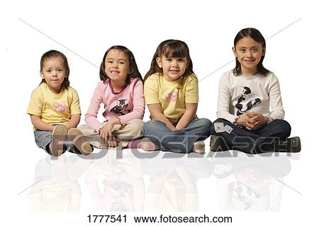 Girls sitting in line View Large Photo Image Stock Image - Girls sitting in line. Fotosearch