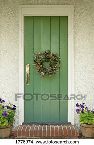 Green door with a wreath View Large Photo Image Picture - Green door with a wreath. Fotosearch