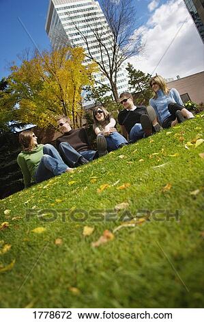 Stock Image - Group of people hanging out. Fotosearch