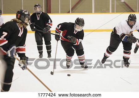 Hockey players on ice View Large Photo Image Picture - Hockey players on ice. Fotosearch