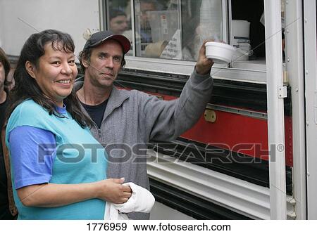 Homeless people receiving lunch View Large Photo Image Stock Photo - Homeless people receiving lunch. Fotosearch