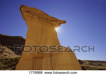 Stock Photo - Hoodoo against a blue sky. Fotosearch