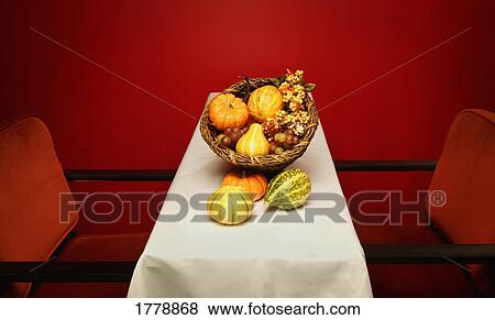 Stock Photo - Horn of plenty on table. Fotosearch