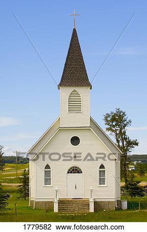 Little white traditional steeple church View Large Photo Image Stock Image - Little white traditional steeple church. Fotosearch