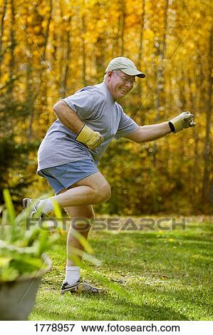 Stock Photo - Man goofs off. Fotosearch