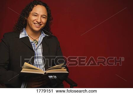 Stock Image - Man reading Bible. Fotosearch