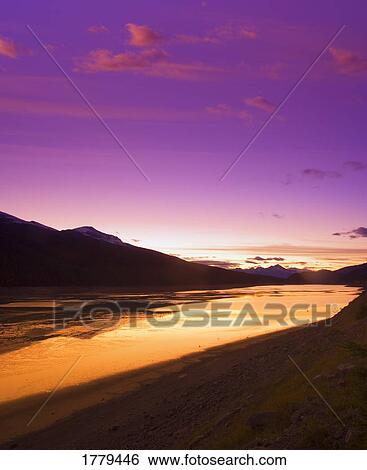 Stock Photograph - Medicine Lake at sunset Jasper National Park. Fotosearch