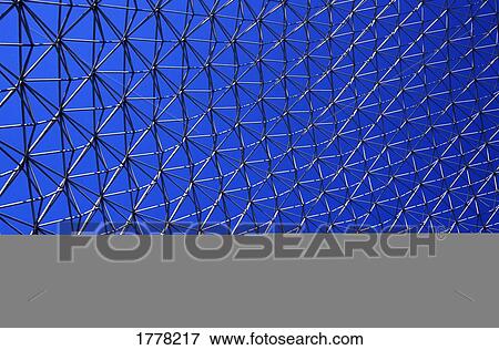 Stock Photo - Metal mesh against a blue sky (bluesky). Fotosearch