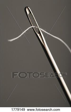 Stock Photo - Needle threaded. Fotosearch