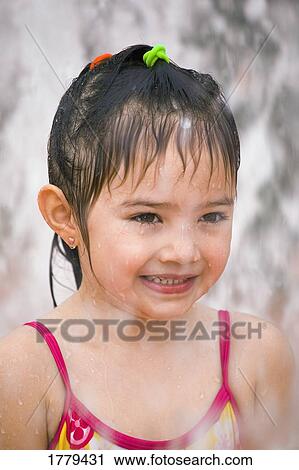Stock Image - Portrait of a wet girl. Fotosearch