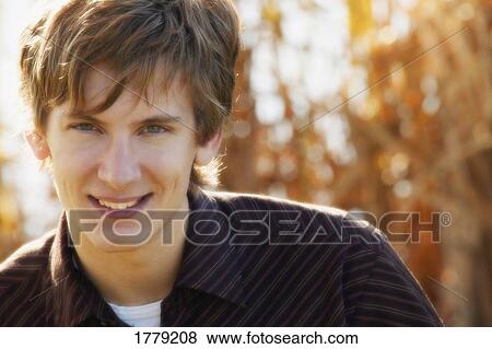 Portrait of a young man View Large Photo Image Stock Photo - Portrait of a young man. Fotosearch