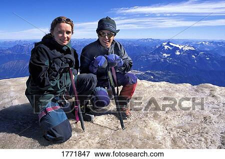 Stock Photo - Portrait of two mountaineers. Fotosearch