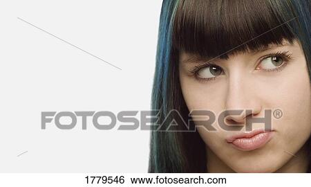 Portrait of woman looking doubtful View Large Photo Image Stock Photograph - Portrait of woman looking doubtful. Fotosearch