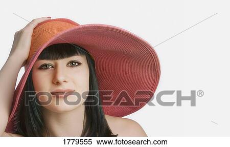 Portrait of woman with large red hat View Large Photo Image Stock Photography - Portrait of woman with large red hat. Fotosearch