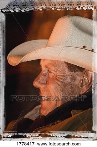 Profile of a cowboy View Large Photo Image Stock Photo - Profile of a cowboy. Fotosearch