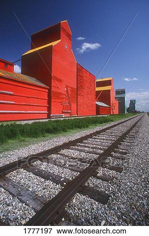 Railway track and Prairie Grain Elevator View Large Photo Image Stock Photo - Railway track and Prairie Grain Elevator. Fotosearch