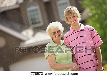 Senior with teenager View Large Photo Image Stock Image - Senior with teenager. Fotosearch
