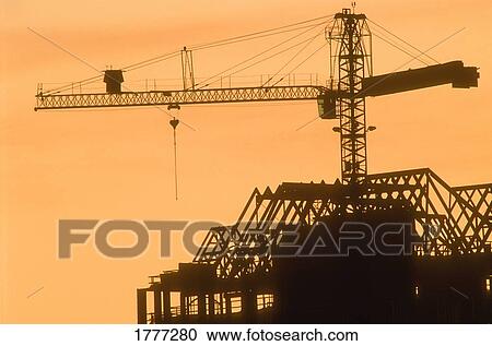 Silhouette of a large crane View Large Photo Image Stock Image - Silhouette of a large crane. Fotosearch