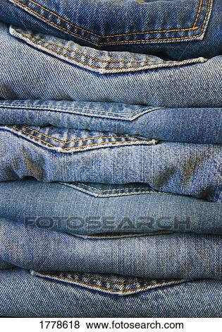 Stack of jeans View Large Photo Image Stock Photo - Stack of jeans. Fotosearch