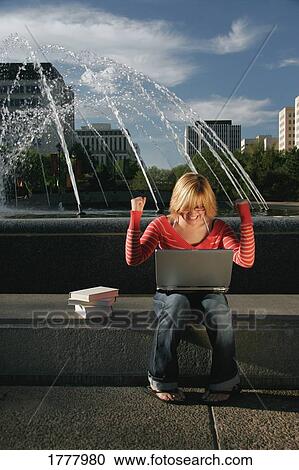 Student reads good news View Large Photo Image Stock Image - Student reads good news. Fotosearch