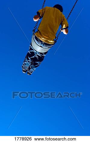 Swinging high View Large Photo Image Stock Photograph - Swinging high. Fotosearch