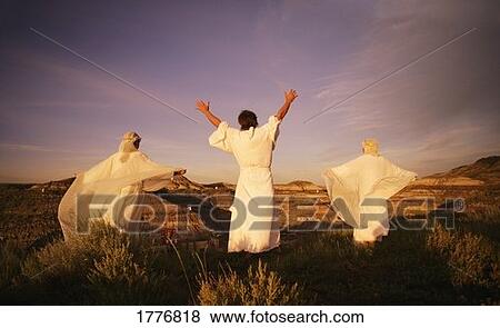 Three angelic people on top of mountains View Large Photo Image Stock Photo - Three angelic people on top of mountains. Fotosearch
