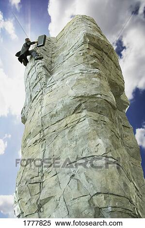 Stock Photography - Upwardly mobile businessman. Fotosearch