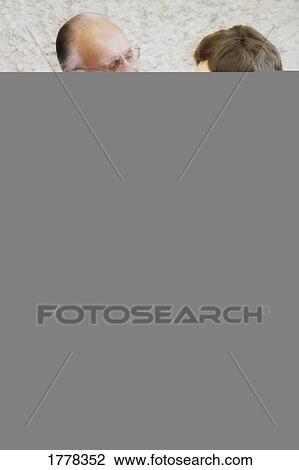 Ventriloquist with puppet View Large Photo Image Stock Image - Ventriloquist with puppet. Fotosearch