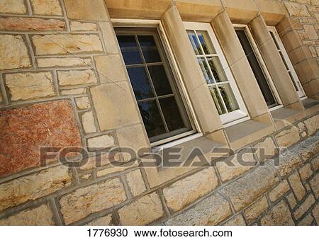 Windows and exterior of building View Large Photo Image Stock Image - Windows and exterior of building. Fotosearch