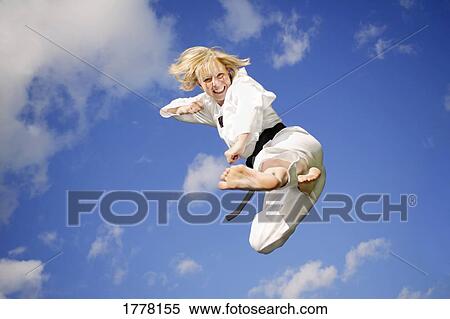Woman doing martial arts View Large Photo Image Stock Photography - Woman doing martial arts. Fotosearch