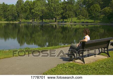 Woman enjoys the view View Large Photo Image Stock Image - Woman enjoys the view. Fotosearch
