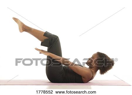 Woman exercises View Large Photo Image Stock Image - Woman exercises. Fotosearch