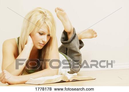 Woman reading bible View Large Photo Image Stock Photo - Woman reading bible. Fotosearch