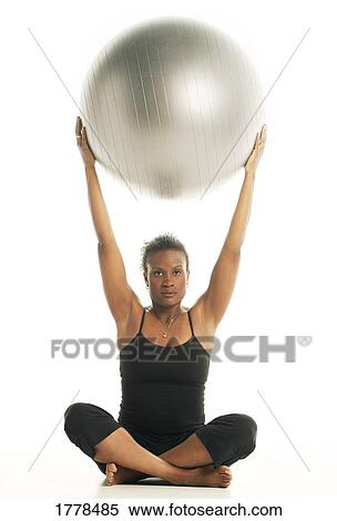 Woman with exercise ball View Large Photo Image Stock Photography - Woman with exercise ball. Fotosearch