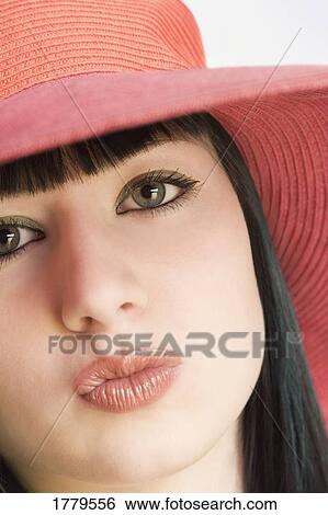 Woman with puckered lips View Large Photo Image Stock Photograph - Woman with puckered lips. Fotosearch