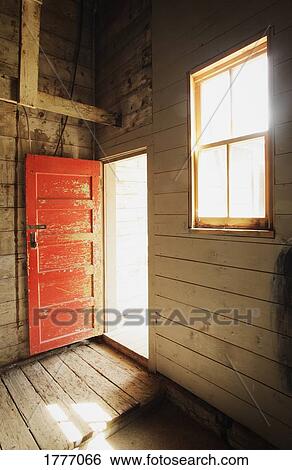 wooden building with open door View Large Photo Image Stock Photograph - wooden building with open door. Fotosearch