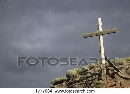 Wooden cross on a hill View Large Photo Image Picture - Wooden cross on a hill. Fotosearch