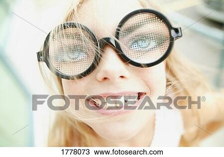 Young girl with funny glasses View Large Photo Image Stock Image - Young girl with funny glasses. Fotosearch
