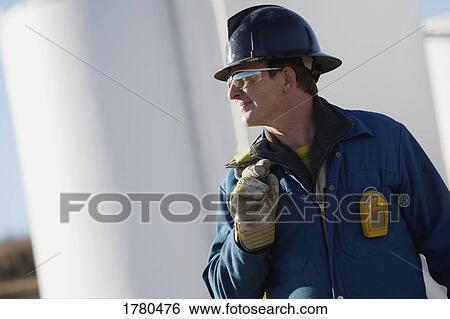Stock Photograph - A blue collar worker. Fotosearch