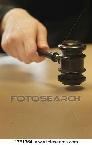 Picture - A judge with gavel. Fotosearch