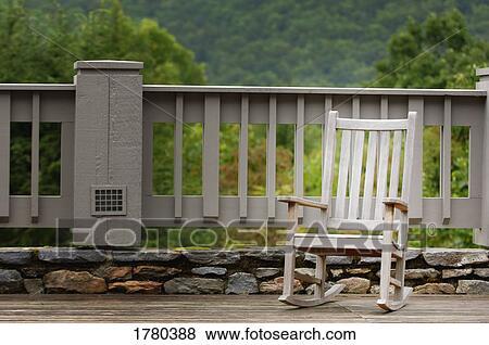 A lonely chair View Large Photo Image Stock Photo - A lonely chair. Fotosearch