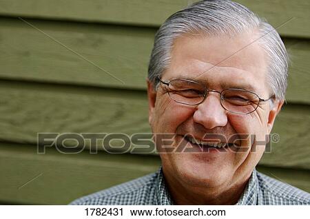 Stock Image - A man laughs. Fotosearch