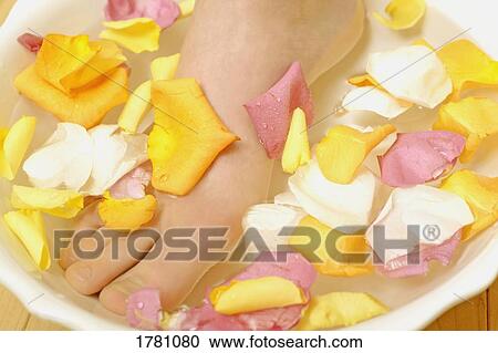 A relaxing foot soak View Large Photo Image Stock Image - A relaxing foot soak. Fotosearch