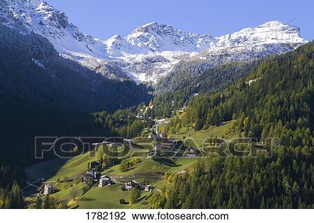 Alpine village in valley View Large Photo Image Stock Image - Alpine village in valley. Fotosearch