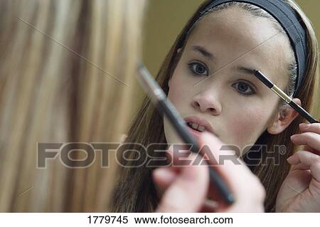Applying makeup View Large Photo Image Stock Photography - Applying makeup. Fotosearch