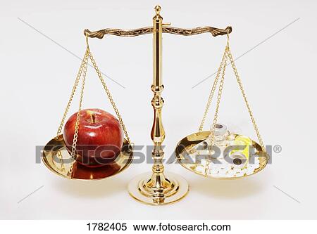 Stock Photography - Balance between nutrition and medication. Fotosearch