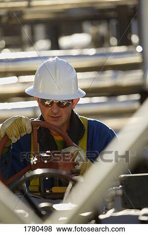 Stock Photo - Blue collar worker. Fotosearch